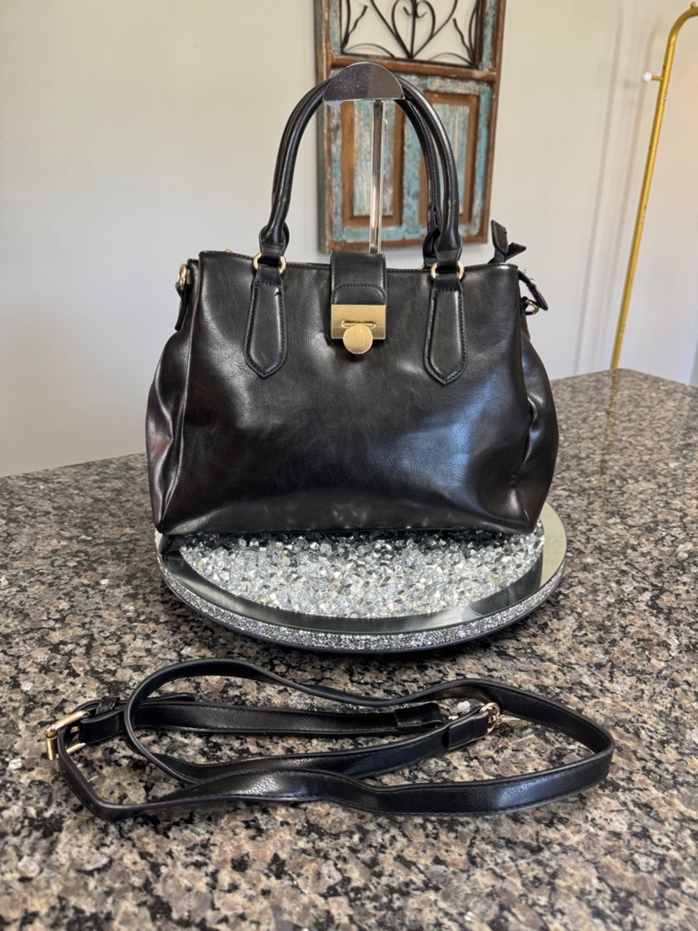 Women's Black Leather Satchel with Gold-Tone Lock and crossbody strap EUC